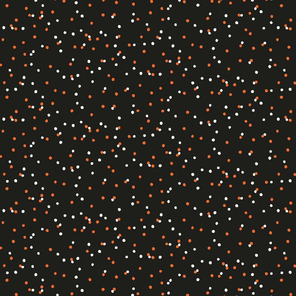 Fabric design showing Halloween dots on black