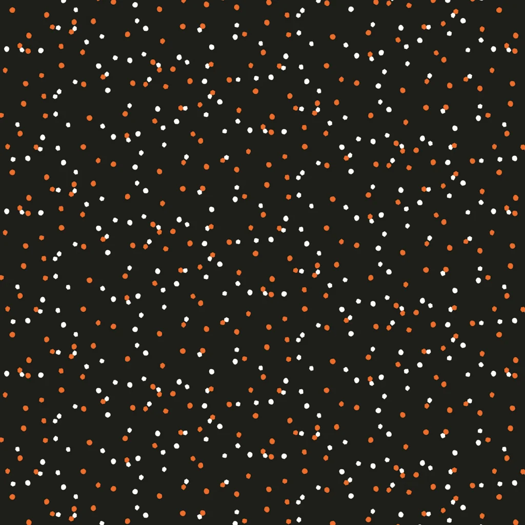 Fabric design showing Halloween dots on black