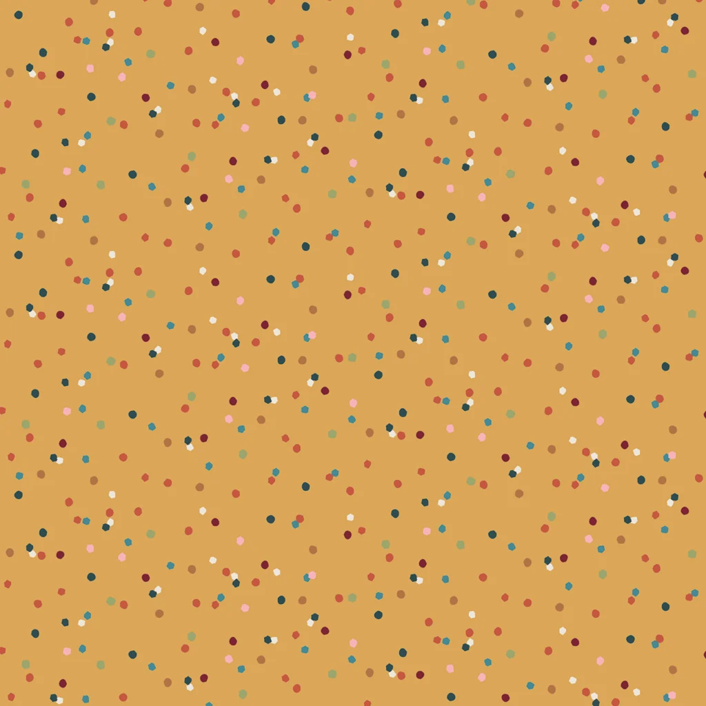 Surface pattern design featuring a warm gold background scattered with multicolored dots in shades of red, blue, pink, green, and white, creating a playful and vibrant aesthetic