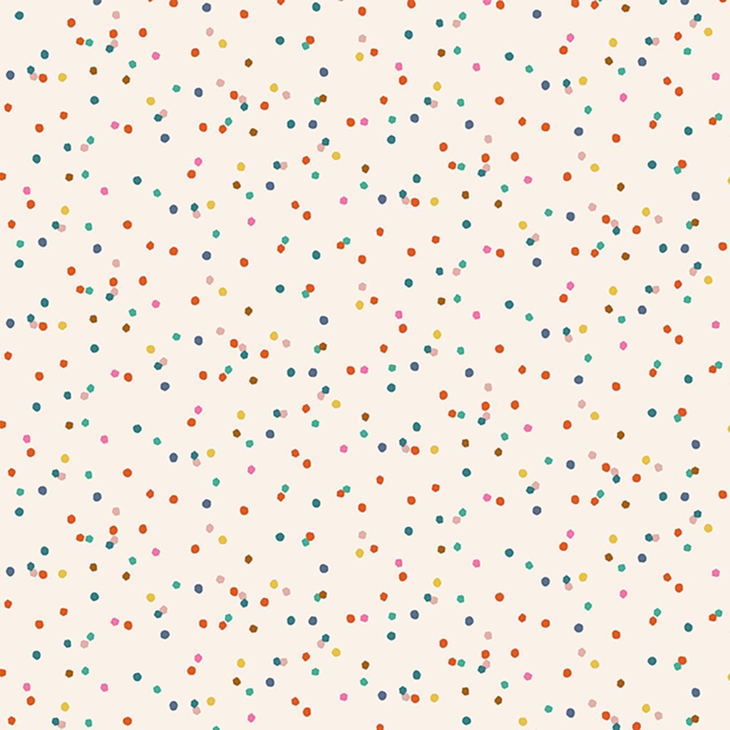 Cream background with scattered coloured dots resulting in a confetti look