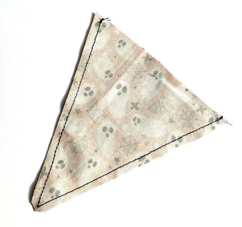 Trimmed seam allowance on a fabric bunting triangle