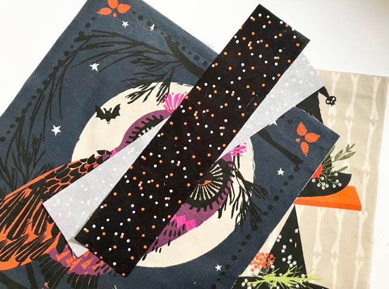 Hocus Pocus fabric pieces and contrast strip