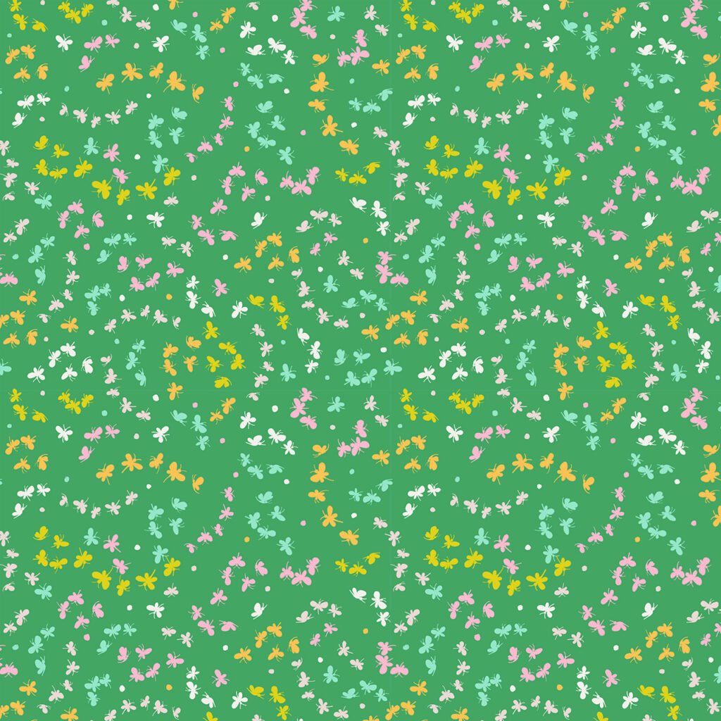 Multi-coloured small butterflies on a green (grass coloured) background